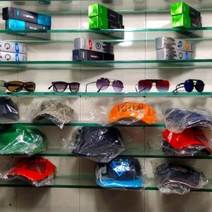 Perfumes, sunglasses and hats